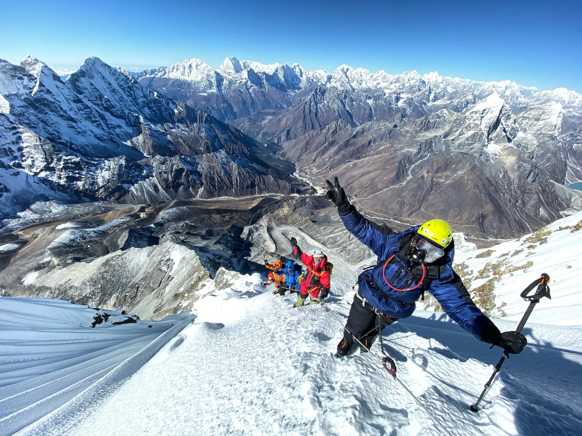 People on top of Ama Dablam after a successful climb in spring window of March 11
